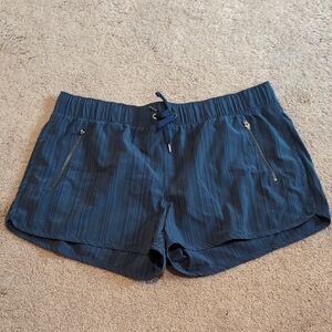 Athleta Dark Blue Athletic Shorts with Zippered Pockets